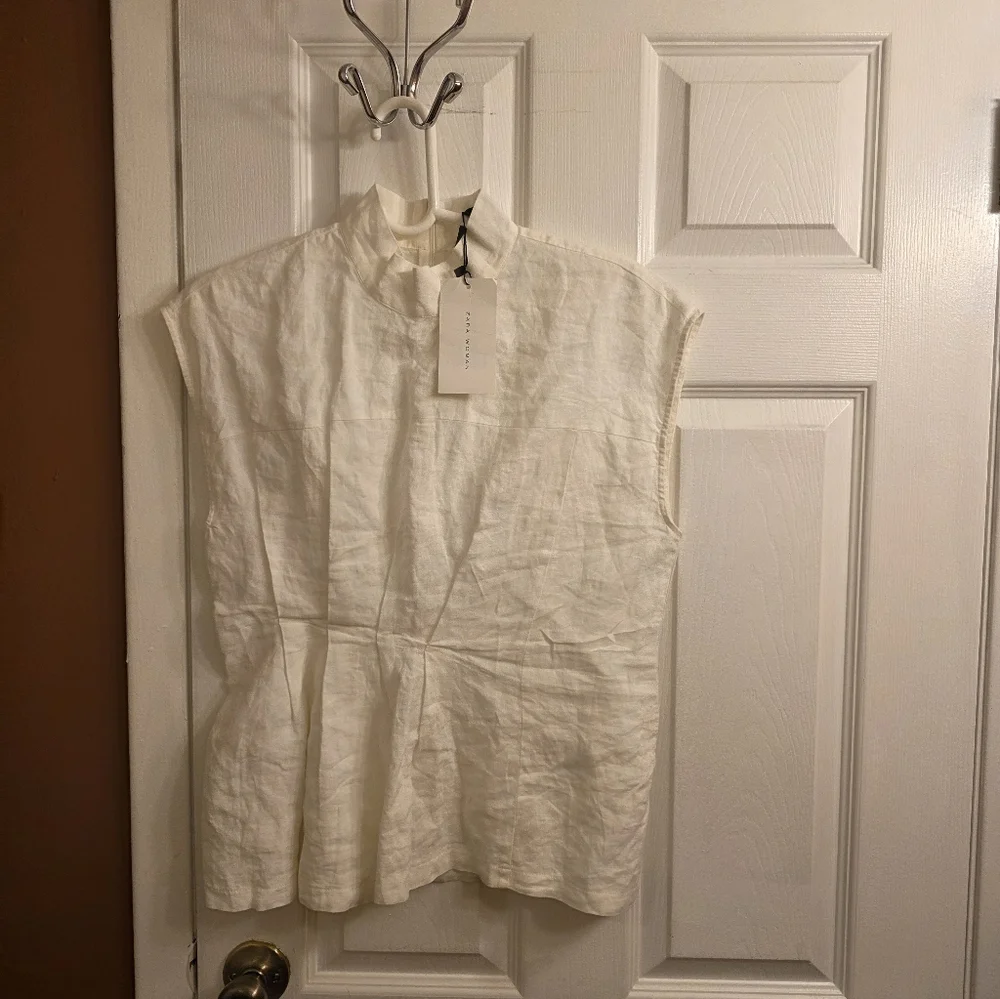 Elegant White Sleeveless Top - Picture 4 of 7